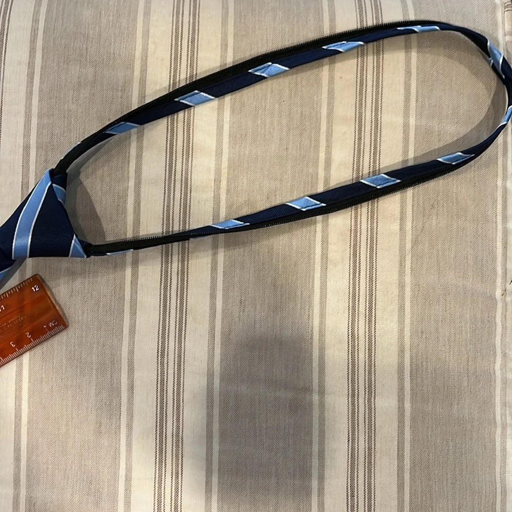 Like new navy and light blue striped zip tie